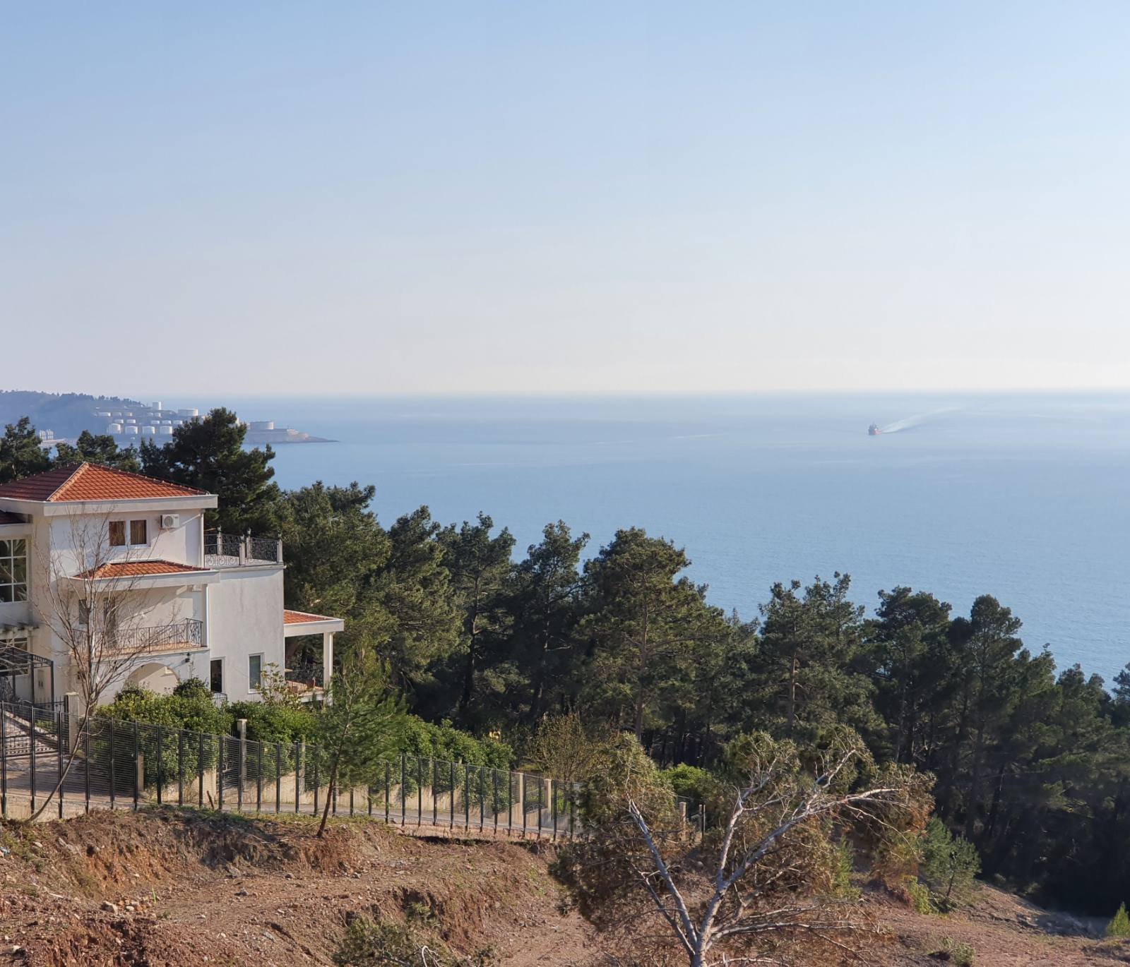 199699034-land-plot-management-real-estate-concept-with-a-vacant-land-on-a-green-field-available-for